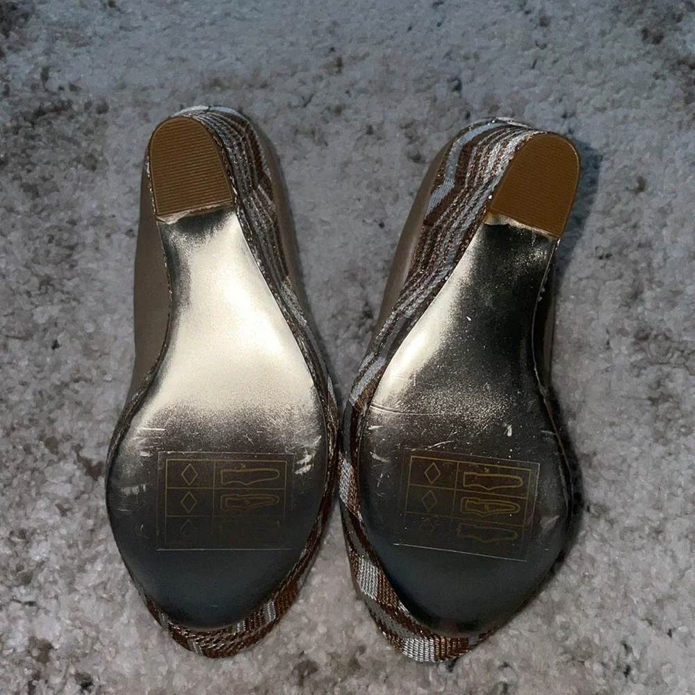 BEBE WEDGES! BRAND NEW!!! Metallic with Tan leather! Size: 6. Comes with Box!